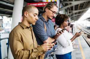 three person holding smartphones